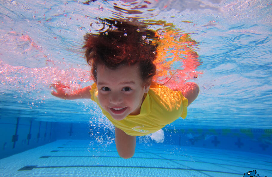 Child swimming in a pool